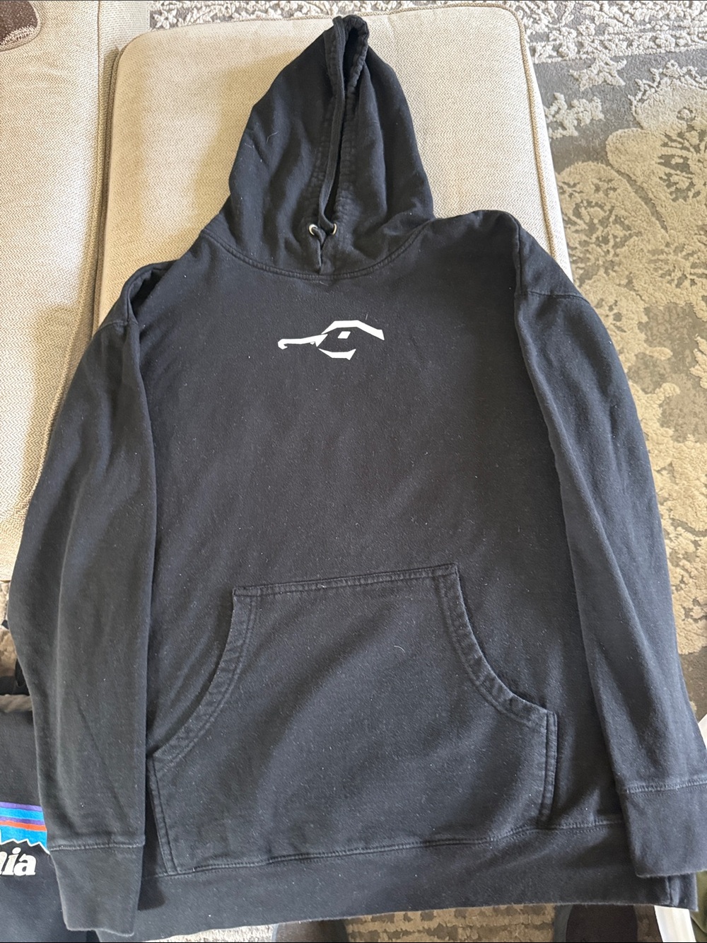 Black Pullover Hoodie with Minimal White Chest Logo